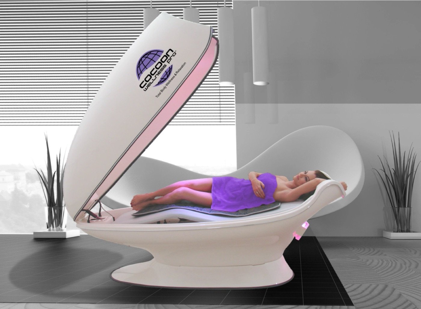 Cocoon Wellness Pro pod, open, with the bed lit by red light